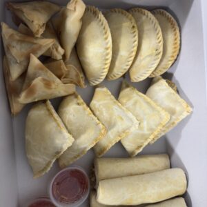 Combo Box ( 6 samosas, 4 mini meat pie/fishrolls, 4 chicken pie)