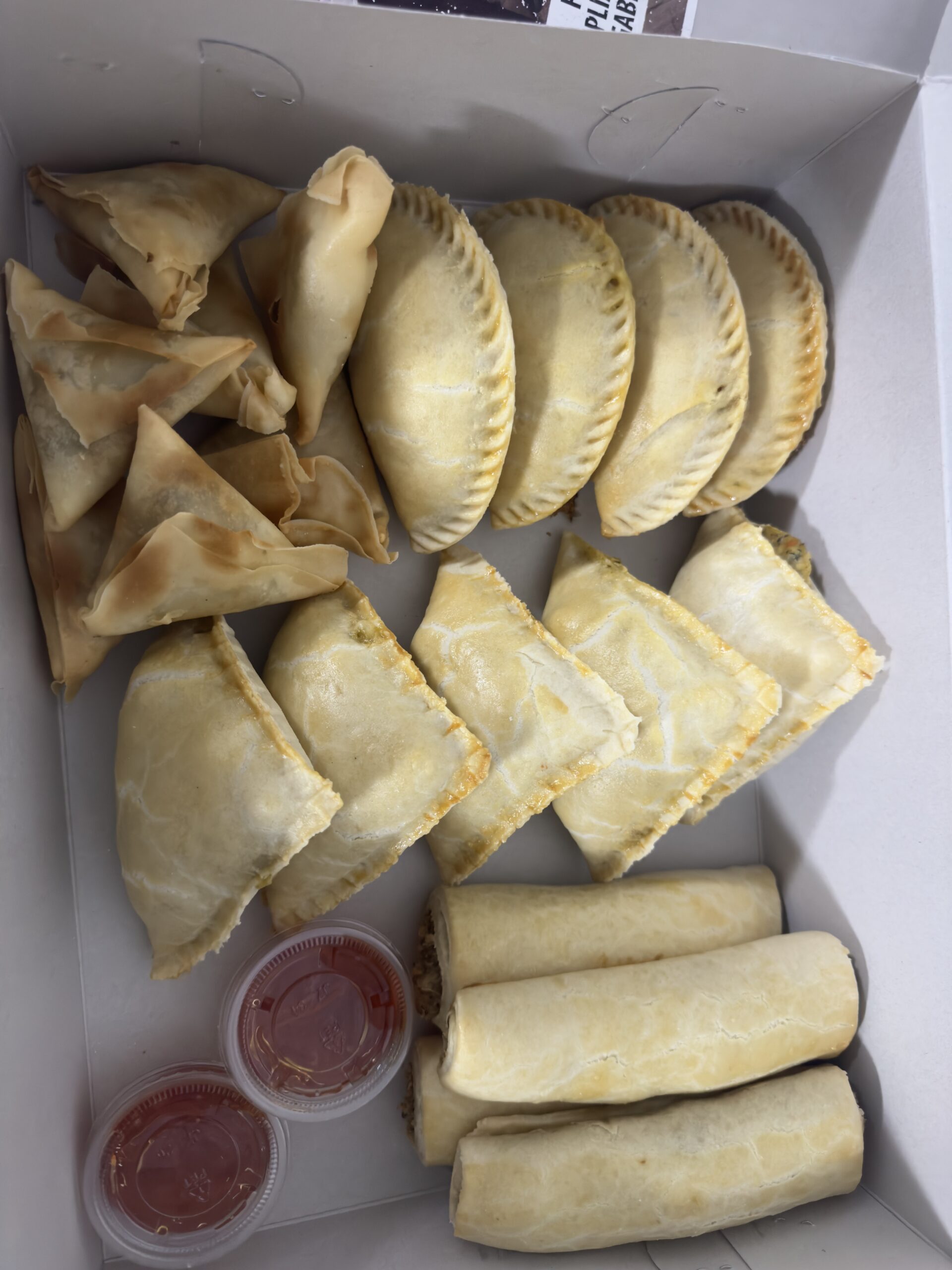 Combo Box ( 6 samosas, 4 mini meat pie/fishrolls, 4 chicken pie)
